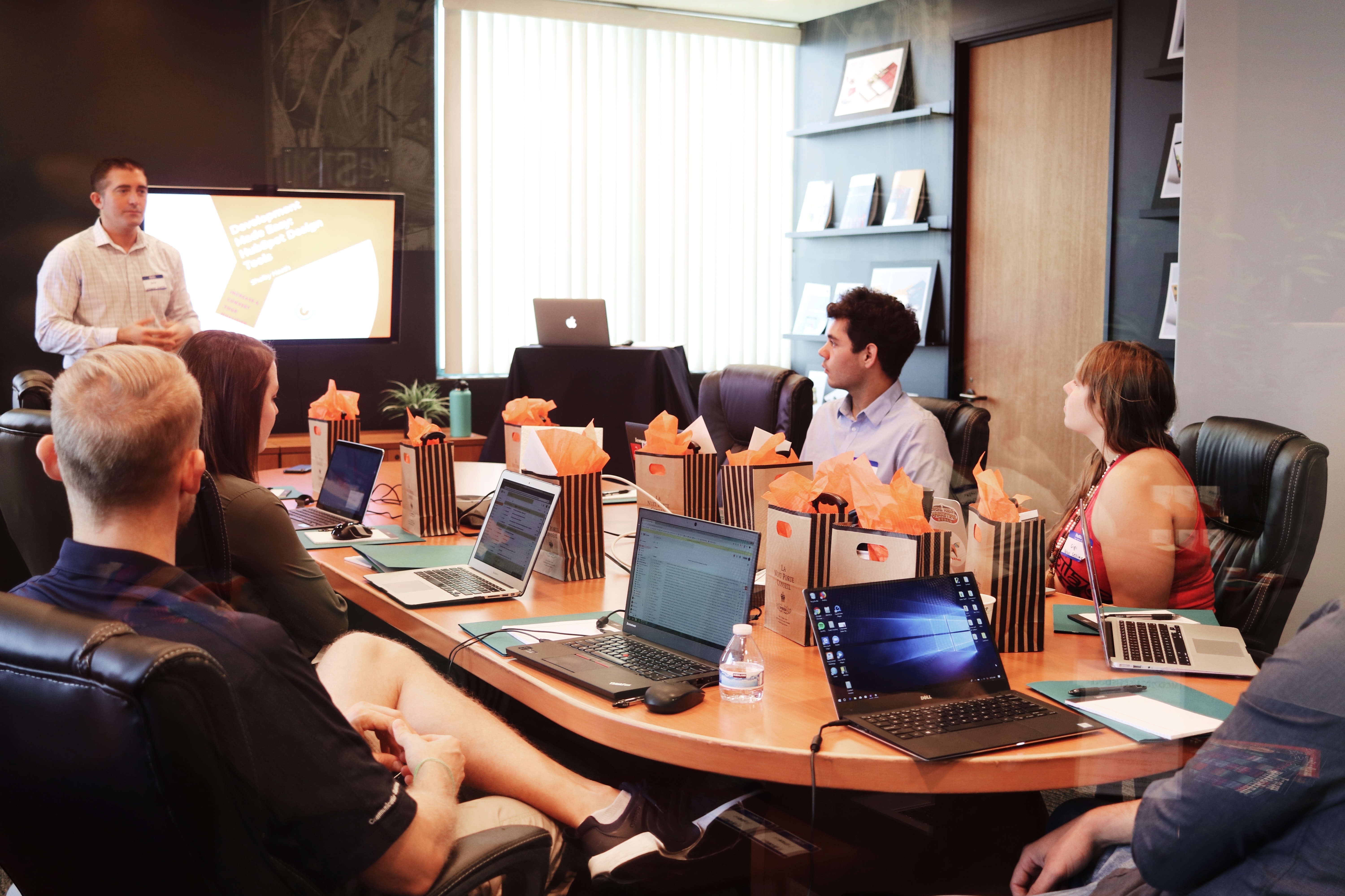 Team meeting in an office and around a table